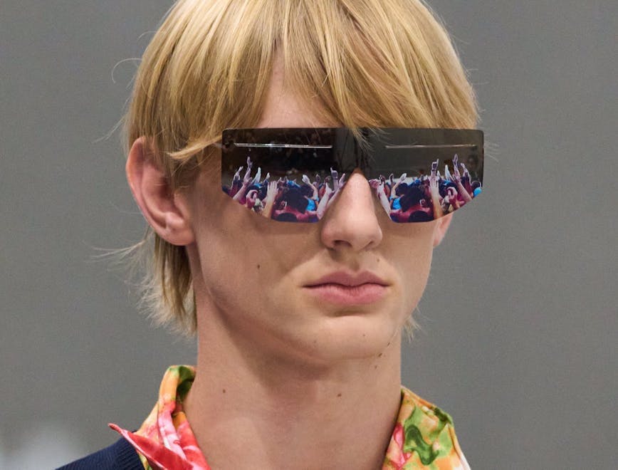 blonde person accessories sunglasses tie face head portrait necklace neck